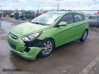 2013 Hyundai Accent SE with VIN KMHCU5AE9DU129440, listed as a IAAI auction lot 41826110 with 207,662 mi miles. Bid and sale history available at carsss.com. Image 17.