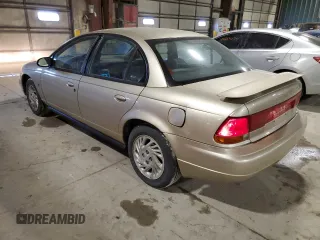 1999 Saturn SL z VIN 1G8ZK5277XZ266298, wystawiony jako Copart lot #41371855 z przebiegiem 85 882 mil mil oraz Szkoda całkowita • Salvage title. Historia ofert i sprzedaży dostępna na DreamBid. Obrazek 2.