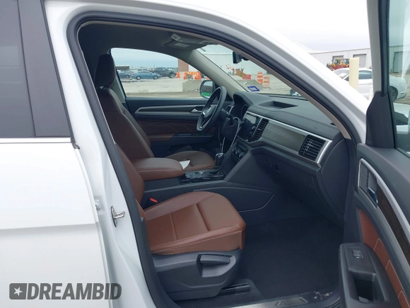 2023 Volkswagen Atlas SE с VIN 1V2WP2CA2PC527423, выставлен на аукционе IAAI как лот 41929349 с пробегом 33 884 миль миль и . История ставок и продаж доступна на DreamBid. Изображение 5.