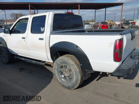 2002 Nissan Frontier SE z VIN 1N6ED27T22C382889, wystawiony jako IAAI lot #41548098 z przebiegiem Nie podano mil oraz . Historia ofert i sprzedaży dostępna na DreamBid. Obrazek 13.