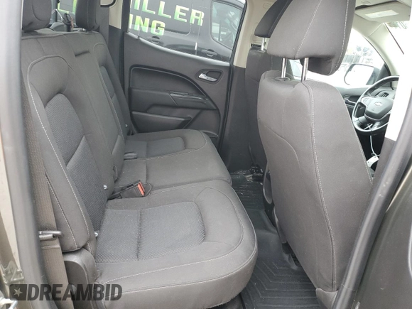 2018 Chevrolet Colorado 4WD LT z VIN 1GCPTCE13J1128382, wystawiony jako Copart lot #86106014 z przebiegiem 113 936 mil mil oraz Szkoda całkowita • Salvage title. Historia ofert i sprzedaży dostępna na DreamBid. Obrazek 10.