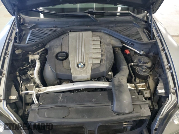2012 BMW X5 35d with VIN 5UXZW0C51CL666413, listed as a Copart auction lot 54561955 with 155,762 mi miles and Clean title. Bid and sale history available at DreamBid. Image 12.