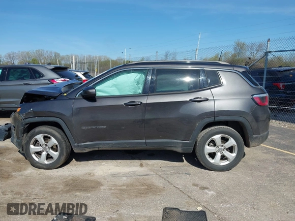 2018 Jeep Compass Altitude with VIN 3C4NJDBB6JT239565, listed as a IAAI auction lot 42219401 with 85,013 mi miles and . Bid and sale history available at DreamBid. Image 14.