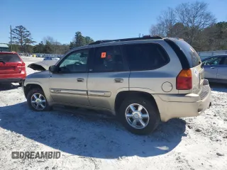 2004 GMC Envoy SLT with VIN 1GKDS13S942169804, listed as a Copart auction lot 47439305 with 240,348 mi miles and Salvage Title. Bid and sale history available at carsss.com. Image 2.
