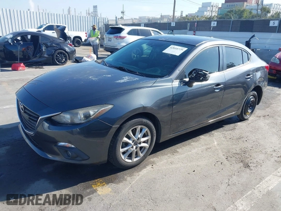 2016 Mazda Mazda3 i Grand Touring with VIN JM1BM1X79G1278079, listed as a IAAI auction lot 42010729 with 104,797 mi miles. Bid and sale history available at carsss.com. Image 2.
