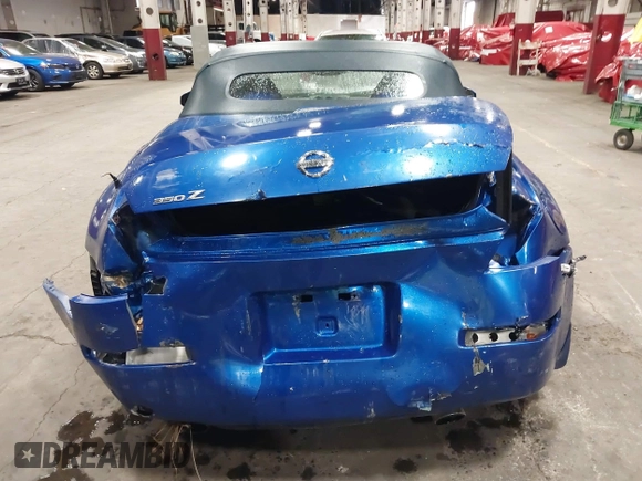 2005 Nissan 350Z Touring z VIN JN1AZ36A95M753704, wystawiony jako IAAI lot #41226946 z przebiegiem 94 351 mil mil oraz . Historia ofert i sprzedaży dostępna na DreamBid. Obrazek 6.