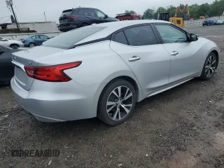 2018 Nissan Maxima SV with VIN 1N4AA6APXJC380082, listed as a Copart auction lot 61170815 with 98,008 mi miles and Salvage title. Bid and sale history available at DreamBid. Image 3.