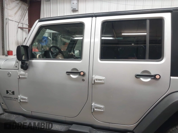 2008 Jeep Wrangler Unlimited X with VIN 1J8GA391X8L606188, listed as a IAAI auction lot 42053480 with 136,844 mi miles and . Bid and sale history available at DreamBid. Image 14.