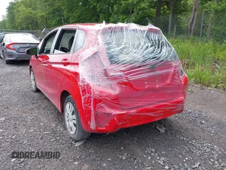 2016 Honda Fit LX with VIN JHMGK5H55GX012649, listed as a IAAI auction lot 42657017 with 82,043 mi miles and . Bid and sale history available at DreamBid. Image 6.