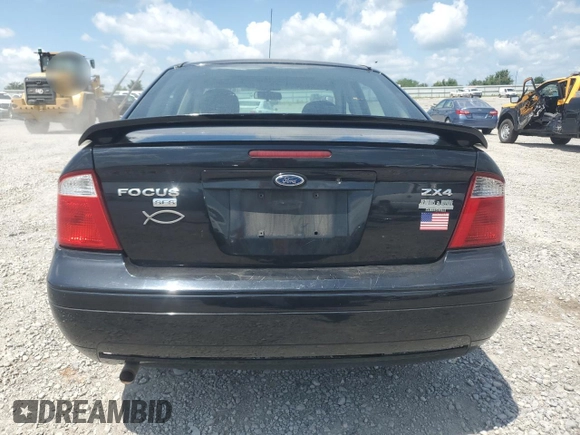 2006 Ford Focus S with VIN 1FAFP34N76W246035, listed as a Copart auction lot 61985015 with 196,498 mi miles and Salvage title. Bid and sale history available at DreamBid. Image 6.