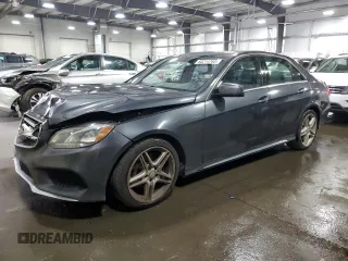 2014 Mercedes-Benz E 350 Luxury with VIN WDDHF8JBXEA859989, listed as a Copart auction lot 60214765 with 156,405 mi miles and Salvage title. Bid and sale history available at DreamBid. Image 1.