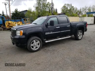 2012 GMC Sierra 2500HD Denali with VIN 1GT125E83CF103859, listed as a Copart auction lot 57359195 with 185,141 mi miles and Clean title. Bid and sale history available at DreamBid. Image 1.