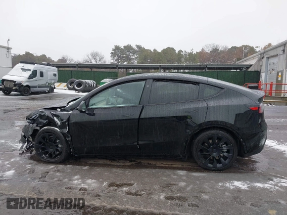 2023 Tesla Model Y Long Range with VIN 7SAYGDEE8PA183301, listed as a IAAI auction lot 41498769 with 82,893 mi miles and . Bid and sale history available at carsss.com. Image 14.