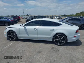 2016 Audi A7 3.0 Prestige with VIN WAU2GAFCXGN102993, listed as a IAAI auction lot 42099259 with 64,490 mi miles. Bid and sale history available at carsss.com. Image 14.