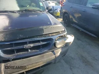2000 Ford Explorer XLS z VIN 1FMZU62X5YUB29943, wystawiony jako Copart lot #41739835 z przebiegiem 147 542 mil mil oraz Szkoda całkowita • Salvage title. Historia ofert i sprzedaży dostępna na DreamBid. Obrazek 11.