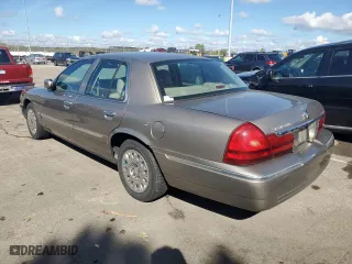 2003 Mercury Grand Marquis GS Convenience with VIN 2MEFM74WX3X707679, listed as a Copart auction lot 73963754 with 75,143 mi miles and Salvage Title. Bid and sale history available at carsss.com. Image 2.