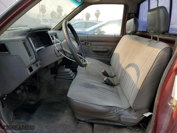 1989 Nissan Hardbody with VIN 1N6ND11S0KC342434, listed as a Copart auction lot 71089274 with NaN miles and Salvage Title. Bid and sale history available at carsss.com. Image 7.