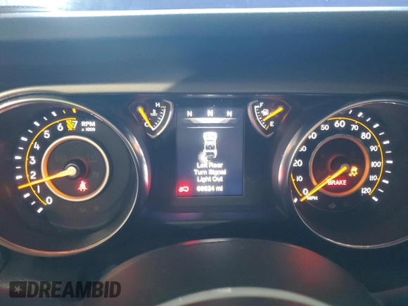 2020 Jeep Wrangler Unlimited Black and Tan with VIN 1C4HJXDG1LW267312, listed as a Copart auction lot 49658135 with 66,624 mi miles and Salvage title. Bid and sale history available at DreamBid. Image 9.