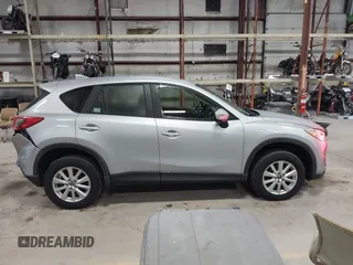 2016 Mazda CX-5 Sport with VIN JM3KE2BY2G0718434, listed as a IAAI auction lot 41961364 with 145,748 mi miles. Bid and sale history available at carsss.com. Image 13.