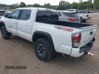 2023 Toyota Tacoma SR z VIN 3TMCZ5AN1PM637609, wystawiony jako IAAI lot #40345917 z przebiegiem 12 614 mil mil oraz . Historia ofert i sprzedaży dostępna na DreamBid. Obrazek 3.