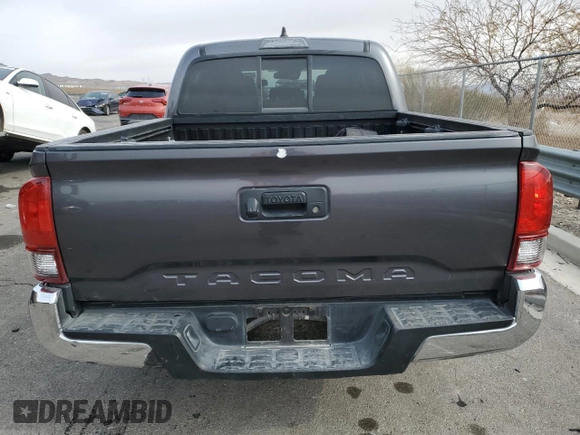 2021 Toyota Tacoma SR with VIN 3TYAX5GN7MT021255, listed as a Copart auction lot 42616935 with 64,626 mi miles and Salvage title. Bid and sale history available at DreamBid. Image 6.