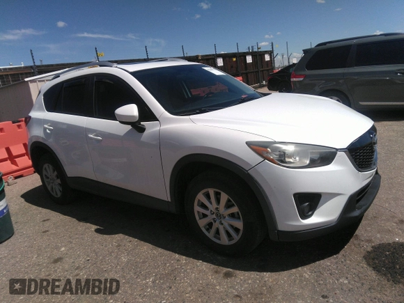 2014 Mazda CX-5 Touring with VIN JM3KE2CY7E0364311, listed as a IAAI auction lot 42108176 with 90,506 mi miles and . Bid and sale history available at DreamBid. Image 13.