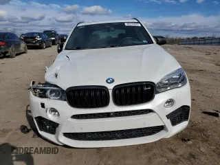 2015 BMW X5 M z VIN 5YMKT6C51F0C89029, wystawiony jako Copart lot #40456604 z przebiegiem 93 203 mil mil oraz . Historia ofert i sprzedaży dostępna na DreamBid. Obrazek 5.