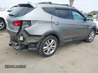 2015 Hyundai Santa Fe z VIN 5XYZW4LA9FG283826, wystawiony jako IAAI lot #42289253 z przebiegiem 120 369 mil mil oraz . Historia ofert i sprzedaży dostępna na DreamBid. Obrazek 4.