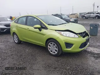 2013 Ford Fiesta SE z VIN 3FADP4BJXDM186634, wystawiony jako IAAI lot #41331391 z przebiegiem 91 560 mil mil oraz . Historia ofert i sprzedaży dostępna na DreamBid. Obrazek 1.