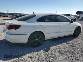 2017 Volkswagen CC Sport with VIN WVWKP7ANXHE503928, listed as a Copart auction lot 71029924 with 105,290 mi miles and Salvage Title. Bid and sale history available at DreamBid. Image 3.