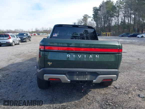 2022 Rivian R1T Adventure z VIN 7FCTGAAA8NN015369, wystawiony jako IAAI lot #41407842 z przebiegiem 22 507 mil mil oraz . Historia ofert i sprzedaży dostępna na DreamBid. Obrazek 16.