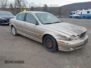 2003 Jaguar X-Type 2.5L Manual z VIN SAJEA51D73XD42031, wystawiony jako IAAI lot #41562914 z przebiegiem 122 643 mil mil oraz . Historia ofert i sprzedaży dostępna na DreamBid. Obrazek 1.