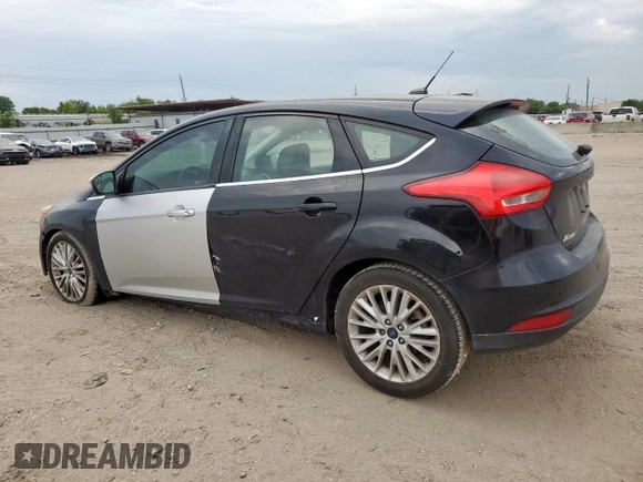 2018 Ford Focus Titanium z VIN 1FADP3N2XJL289659, wystawiony jako Copart lot #65594275 z przebiegiem 115 739 mil mil oraz Czysty tytuł • Clean title. Historia ofert i sprzedaży dostępna na DreamBid. Obrazek 2.