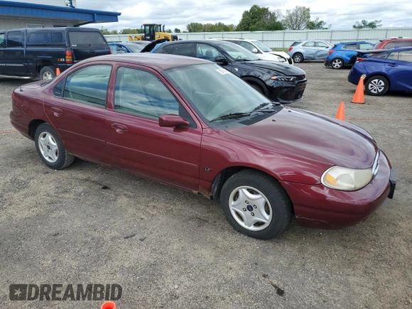 1999 Ford Contour with VIN 1FAFP653XXK231570, listed as a Copart auction lot 70575674 with 120,770 mi miles and Clean title. Bid and sale history available at DreamBid. Image 4.