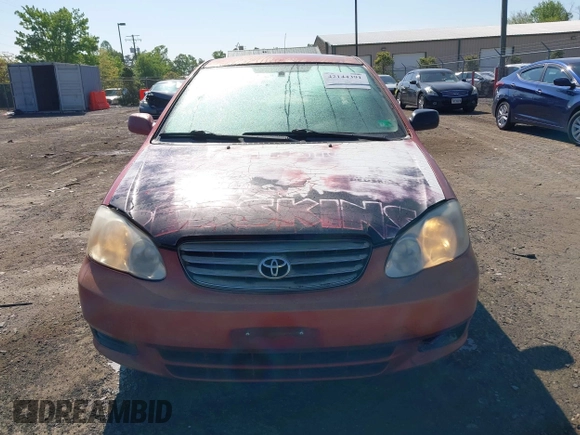 2004 Toyota Corolla CE with VIN 2T1BR32E44C296063, listed as a IAAI auction lot 42144391 with 299,999 mi miles and . Bid and sale history available at DreamBid. Image 12.