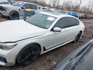 2016 BMW 7 Series 740i with VIN WBA7E2C50GG714647, listed as a IAAI auction lot 41745442 with 134,399 mi miles and . Bid and sale history available at carsss.com. Image 15.