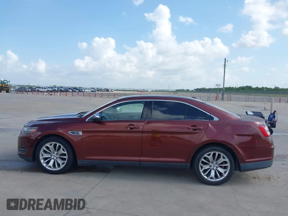 2015 Ford Taurus Limited with VIN 1FAHP2F85FG165586, listed as a IAAI auction lot 42565514 with 183,365 mi miles and . Bid and sale history available at DreamBid. Image 14.