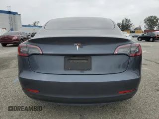2023 Tesla Model 3 with VIN 5YJ3E1EA4PF642769, listed as a Copart auction lot 50648825 with 25,310 mi miles and Salvage title. Bid and sale history available at DreamBid. Image 6.