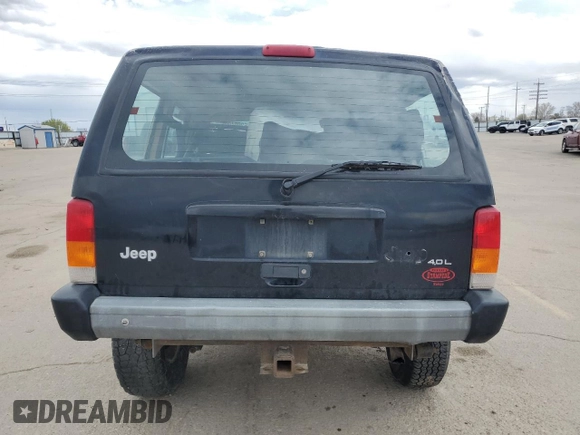 1998 Jeep Cherokee Sport with VIN 1J4FJ68S6WL188802, listed as a Copart auction lot 52094005 with 199,586 mi miles and Salvage Title. Bid and sale history available at carsss.com. Image 6.