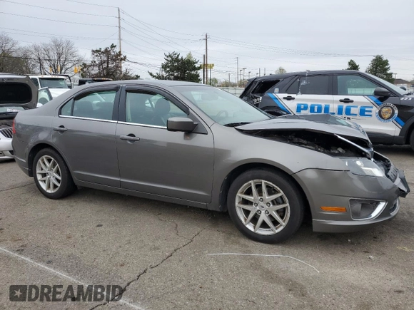 2010 Ford Fusion SEL with VIN 3FAHP0JAXAR249922, listed as a Copart auction lot 51910955 with 216,865 mi miles and Salvage Title. Bid and sale history available at carsss.com. Image 4.
