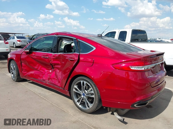2017 Ford Fusion Titanium with VIN 3FA6P0K98HR207447, listed as a IAAI auction lot 42422213 with 59,549 mi miles and . Bid and sale history available at DreamBid. Image 3.