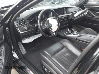 2016 BMW M5 z VIN WBSFV9C54GD595793, wystawiony jako IAAI lot #42101121 z przebiegiem 58 775 mil mil oraz . Historia ofert i sprzedaży dostępna na DreamBid. Obrazek 5.