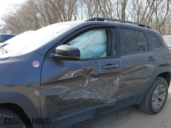 2022 Jeep Cherokee Trailhawk with VIN 1C4PJMBX4ND536592, listed as a IAAI auction lot 41792322 with 43,611 mi miles and . Bid and sale history available at DreamBid. Image 14.