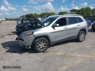2017 Jeep Cherokee Latitude with VIN 1C4PJLCB3HW542048, listed as a IAAI auction lot 41586270 with 123,111 mi miles. Bid and sale history available at carsss.com. Image 2.