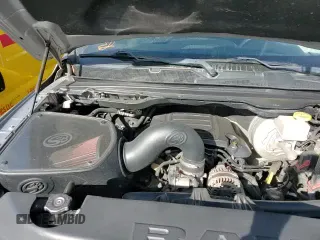 2019 Ram 1500 Tradesman z VIN 1C6RREGT1KN590345, wystawiony jako Copart lot #49413505 z przebiegiem 128 091 mil mil oraz Szkoda całkowita • Salvage title. Historia ofert i sprzedaży dostępna na DreamBid. Obrazek 13.