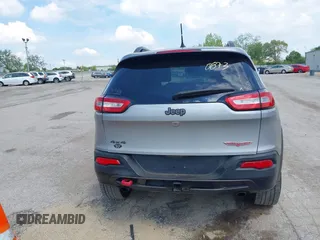2015 Jeep Cherokee Trailhawk z VIN 1C4PJMBS5FW615313, wystawiony jako IAAI lot #42250873 z przebiegiem 148 008 mil mil oraz . Historia ofert i sprzedaży dostępna na DreamBid. Obrazek 16.