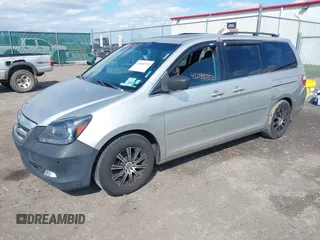 2007 Honda Odyssey Touring with VIN 5FNRL38827B045088, listed as a IAAI auction lot 42088752 with 224,655 mi miles. Bid and sale history available at carsss.com. Image 2.