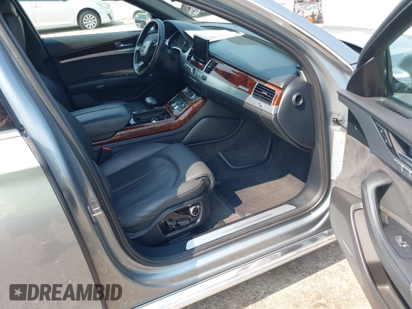 2013 Audi A8 4.0L with VIN WAUA2AFD5DN021950, listed as a IAAI auction lot 42472512 with 126,964 mi miles and . Bid and sale history available at DreamBid. Image 5.