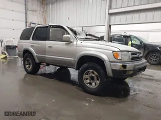 1998 Toyota 4Runner Limited with VIN JT3HN87R0W0189219, listed as a IAAI auction lot 41815288 with 227,784 mi miles. Bid and sale history available at carsss.com. Image 1.