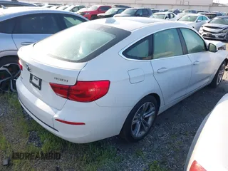 2018 BMW 3 Series 330i xDrive with VIN WBA8Z9C5XJG828406, listed as a IAAI auction lot 41236150 with 36,815 mi miles. Bid and sale history available at carsss.com. Image 4.
